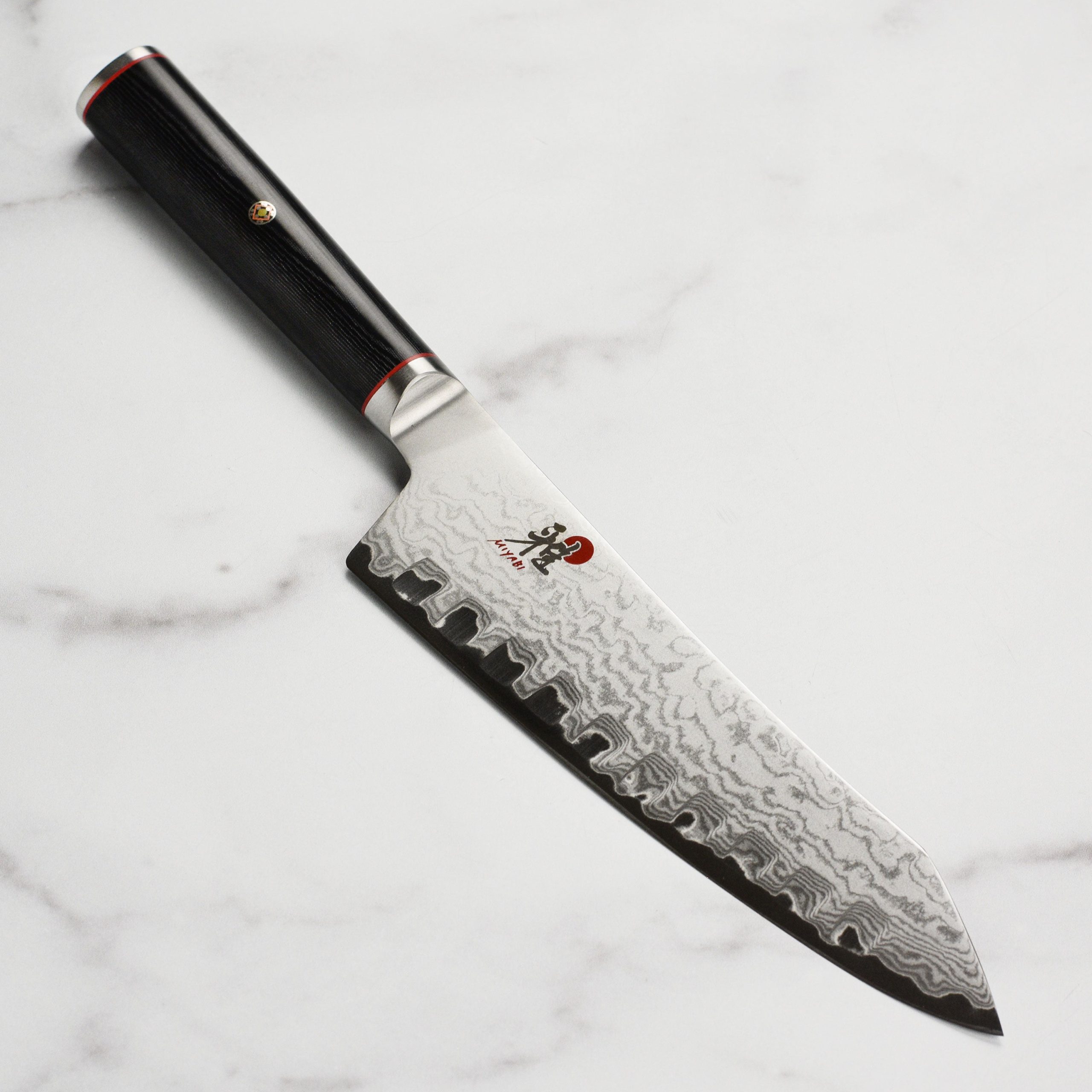 Miyabi Kaizen 7″ Hollow Edge Rocking Santoku Knife